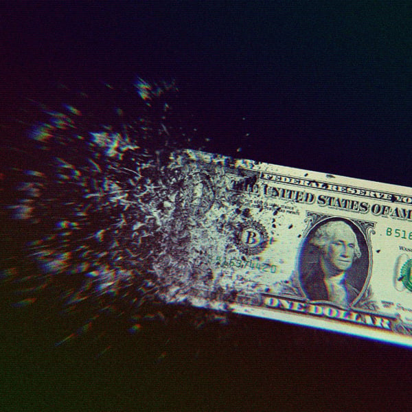 A dollar bill disintegrating.