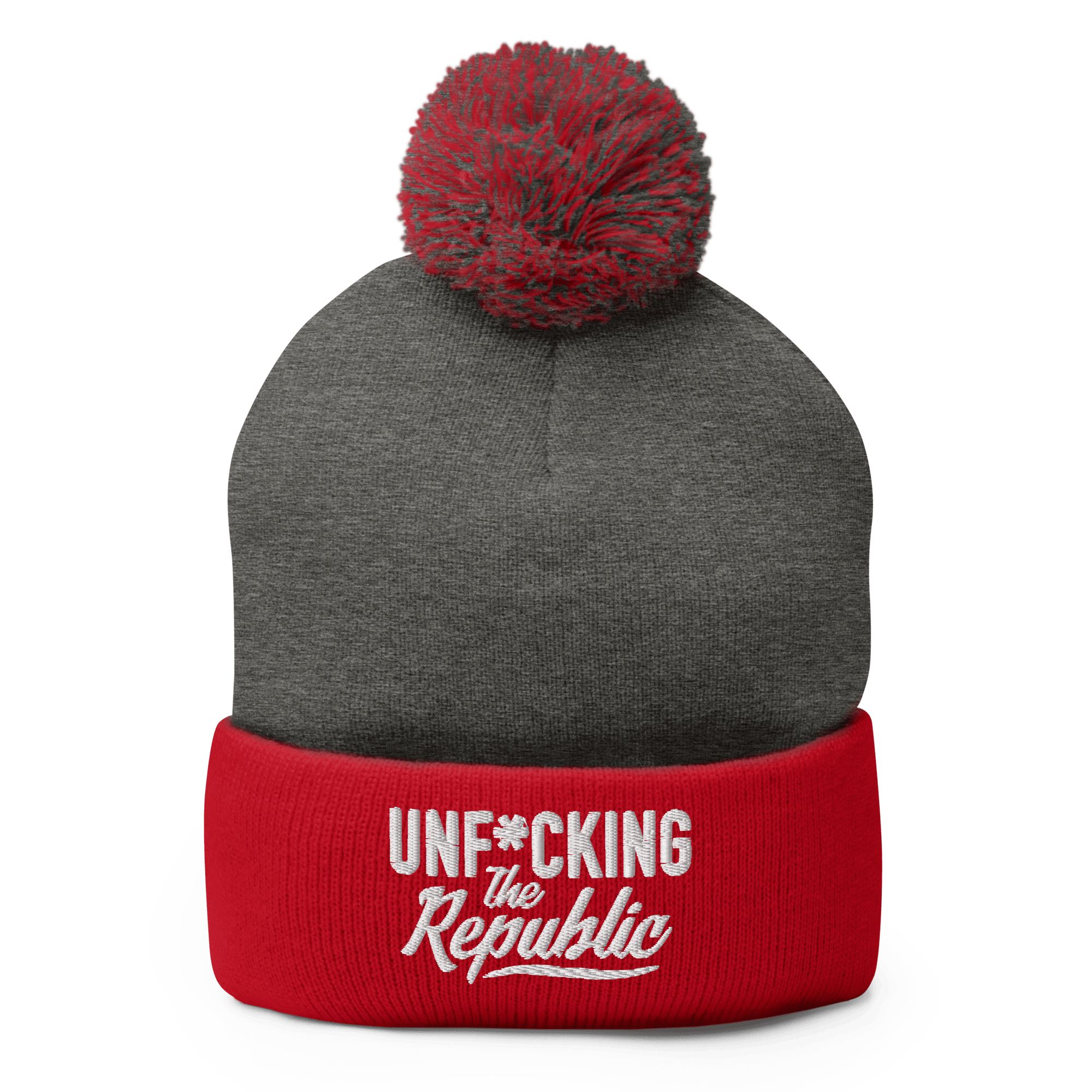 Red and grey cuffed beanie with a red and grey pom pom on top and embroidered white text that says Unf*cking The Republic